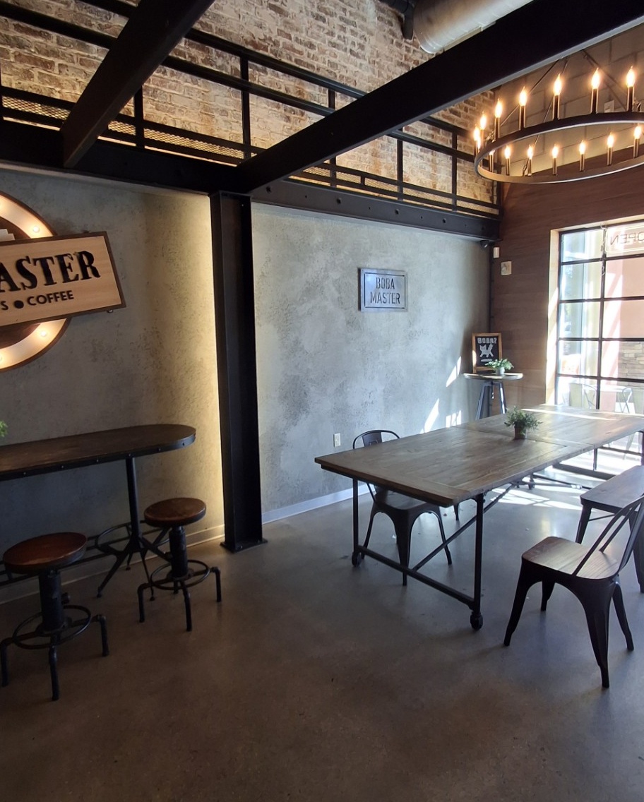 Café counter and interior with warm wood and concrete